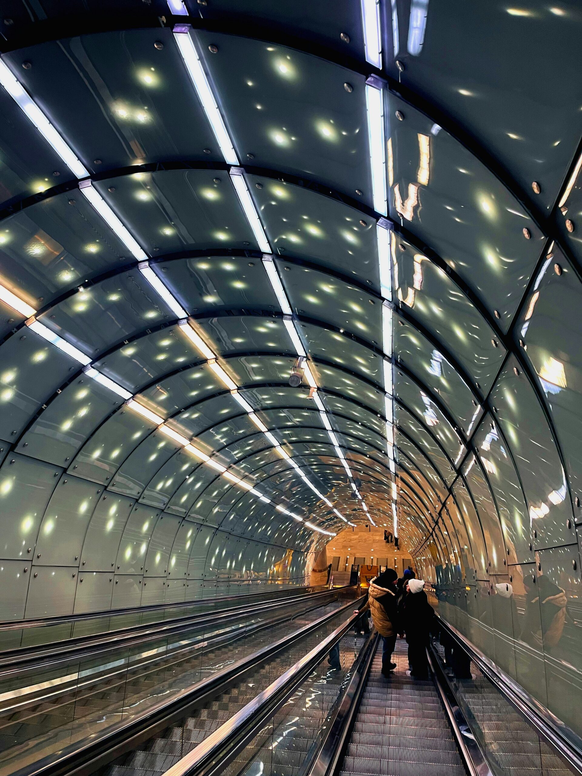 Escalators inside an underground train station